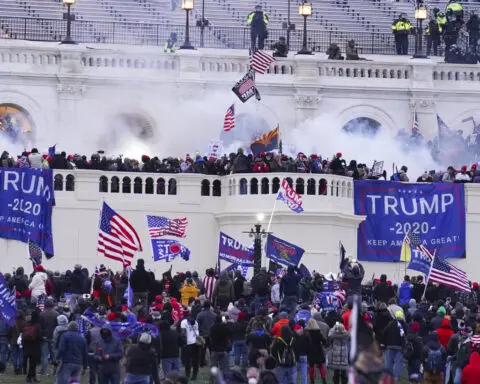 Ex-police officer who joined Capitol riot receives a reduced prison sentence