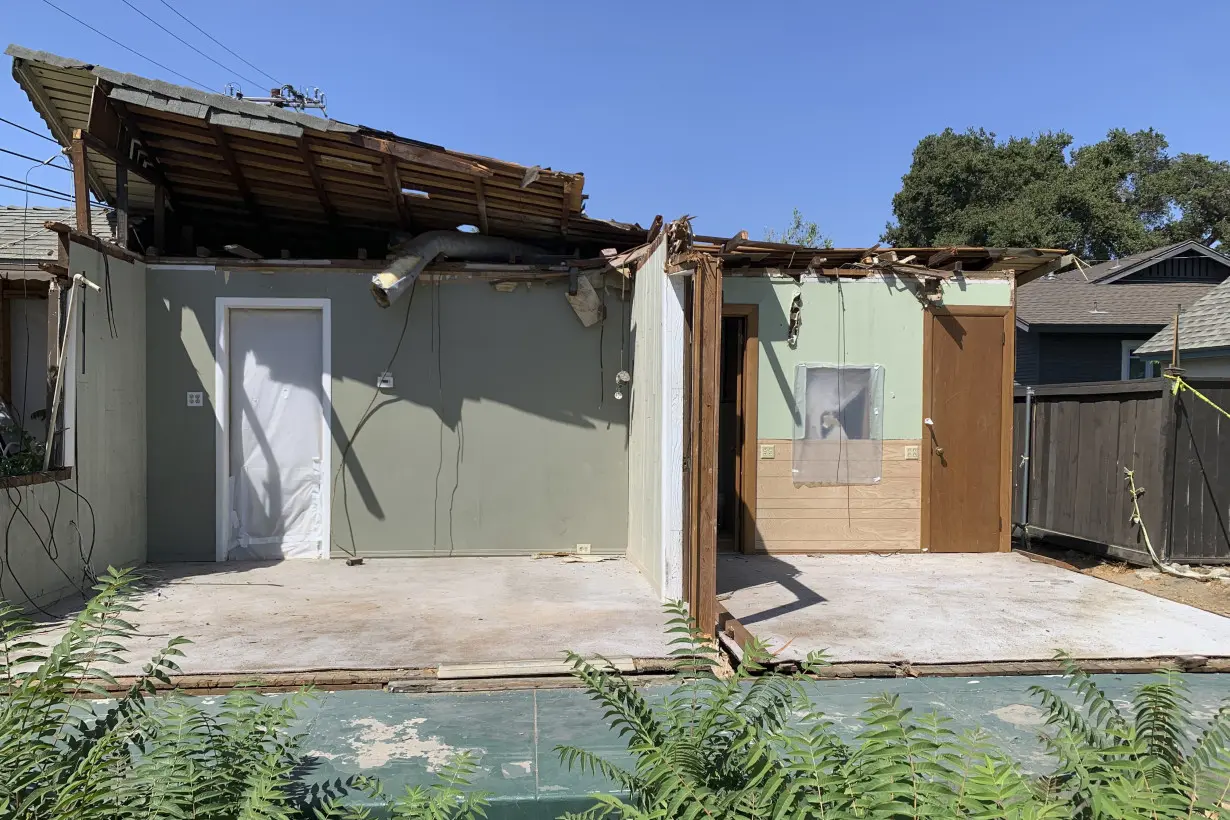 Half a house for half a million dollars: Home crushed by tree hits market near Los Angeles