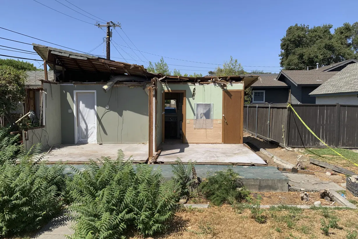 Half a house for half a million dollars: Home crushed by tree hits market near Los Angeles