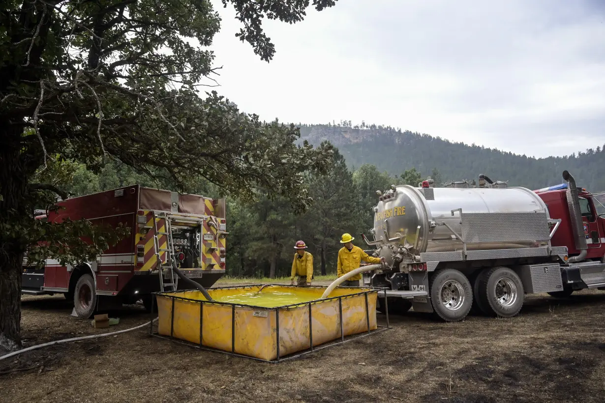 Crews slow progress of Sierra wildfire, but evacuations orders remain