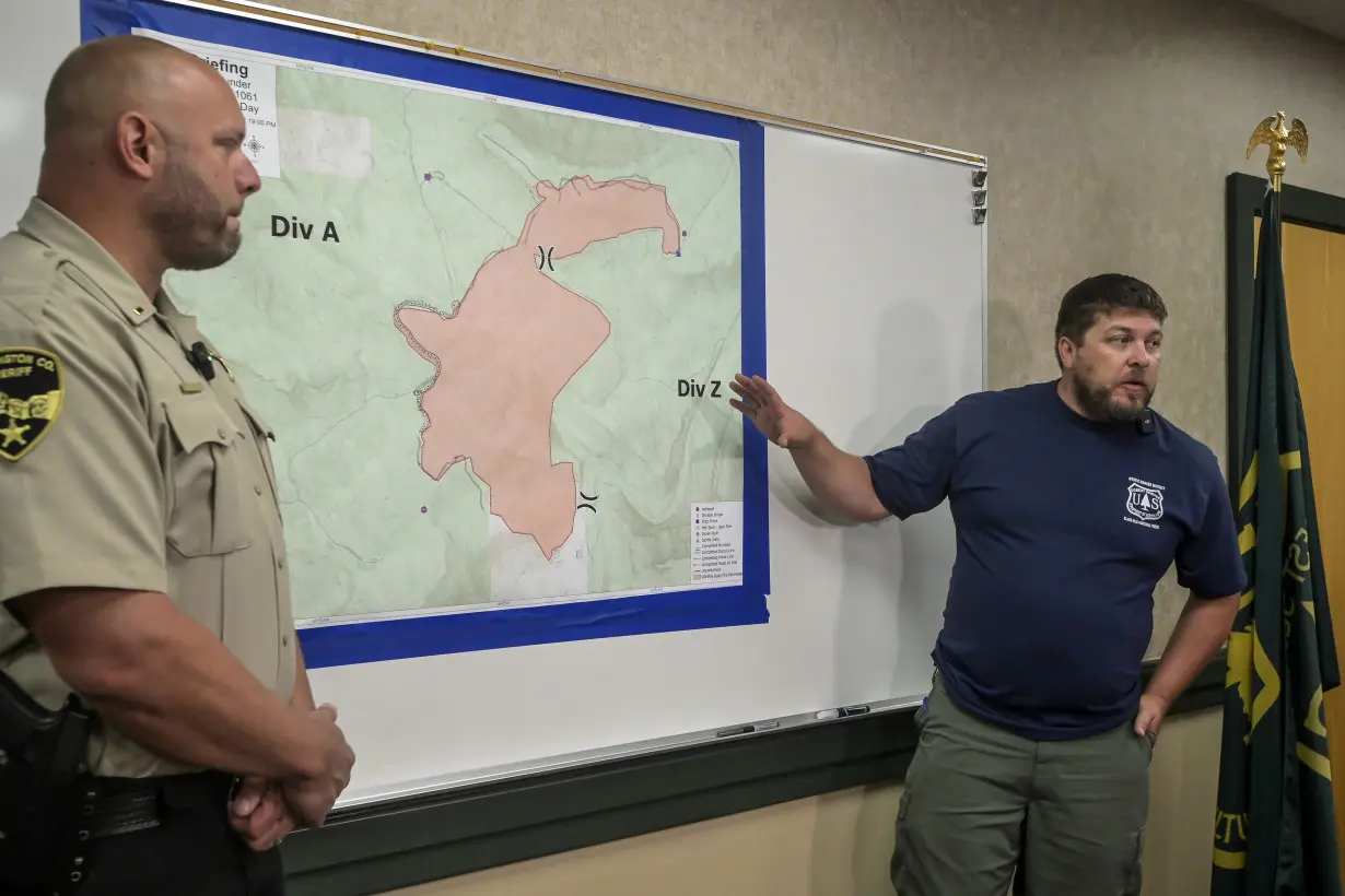 Crews slow progress of Sierra wildfire, but evacuations orders remain