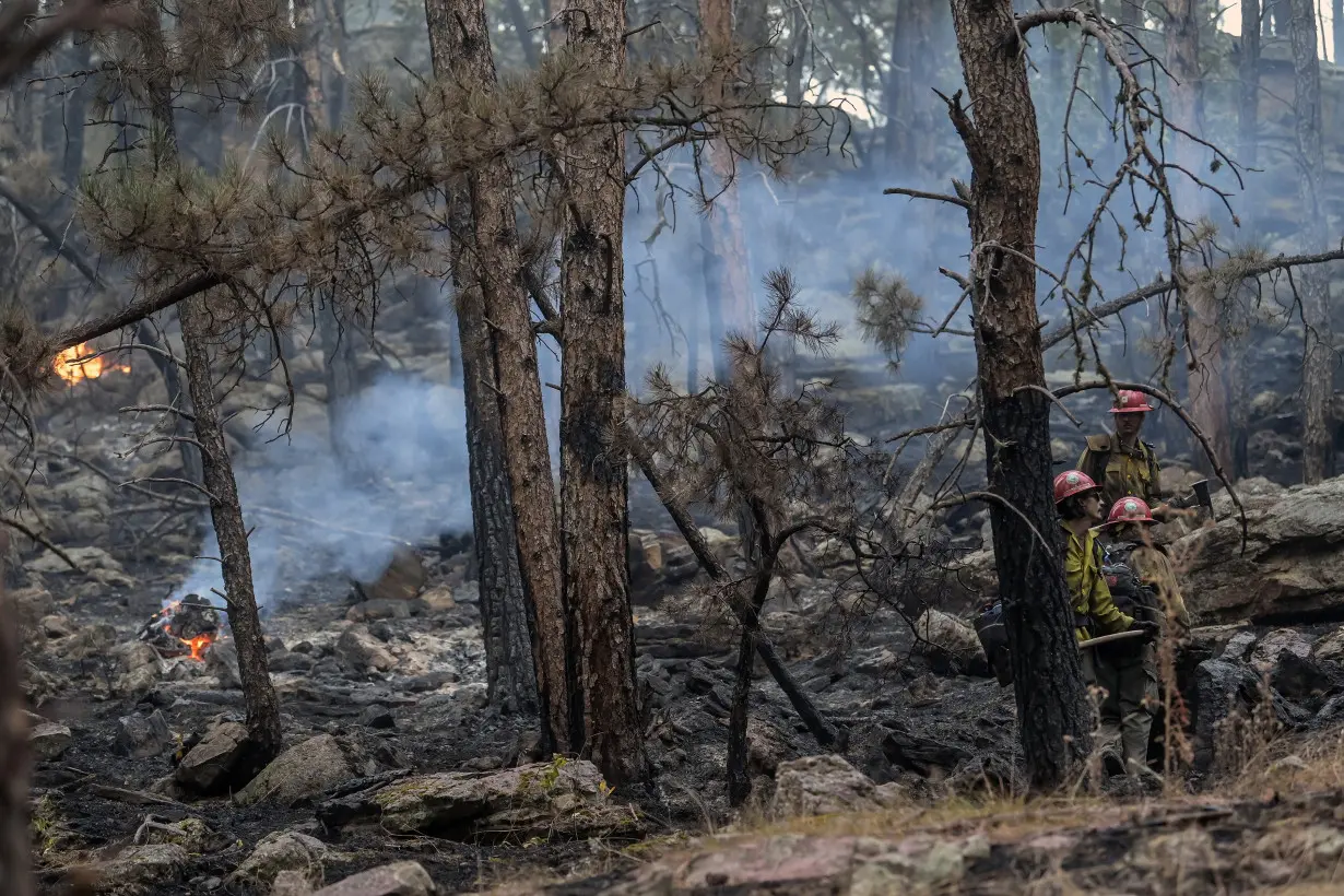 Crews slow progress of Sierra wildfire, but evacuations orders remain