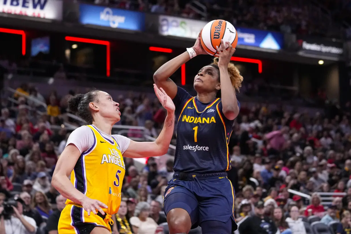 Caitlin Clark makes her 100th 3, finishes with triple-double as Fever beat Sparks 93-86