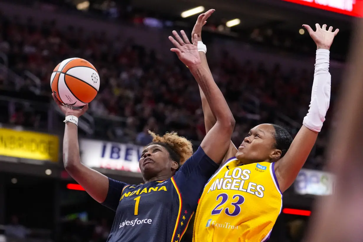 Caitlin Clark makes her 100th 3, finishes with triple-double as Fever beat Sparks 93-86