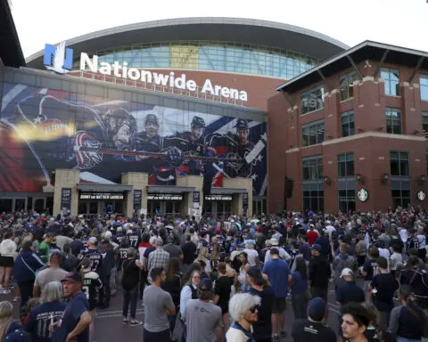 Blue Jackets fans and players remember the Gaudreau brothers at a candlelight vigil in Columbus