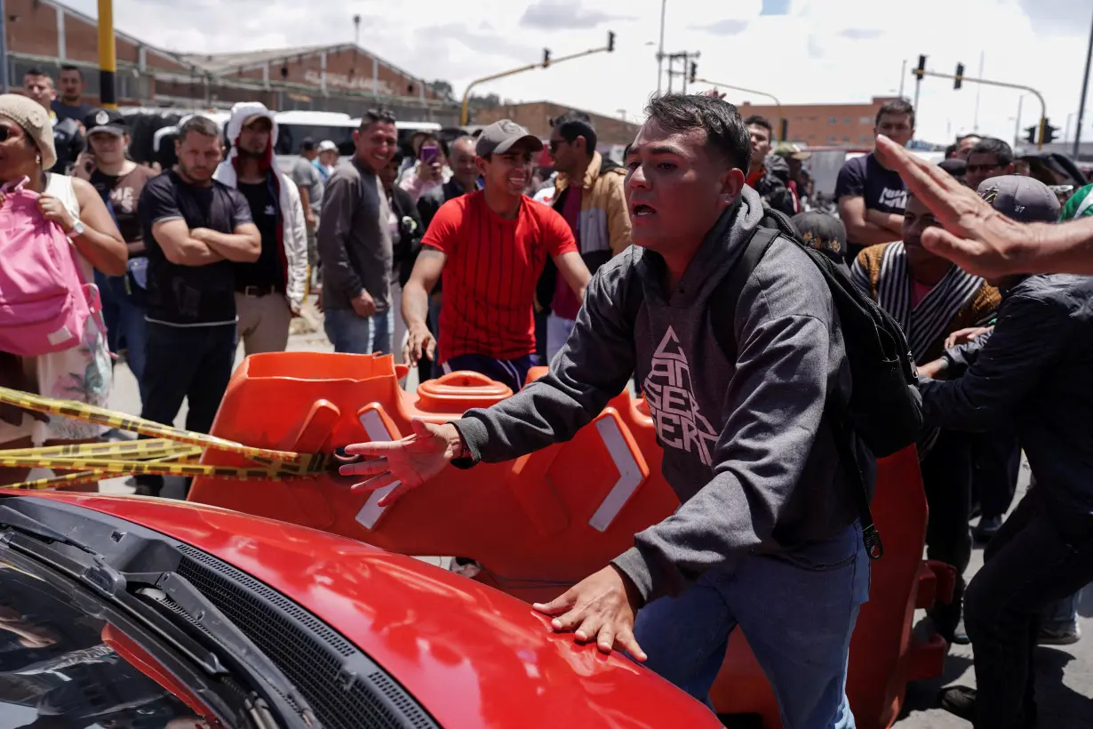 Truckers protest over diesel price hike, in Bogota