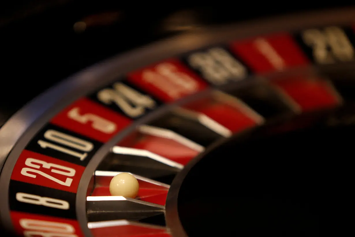 FILE PHOTO: The spinning wheel on a Roulette table is seen at the Dragonara Casino in St Julian's