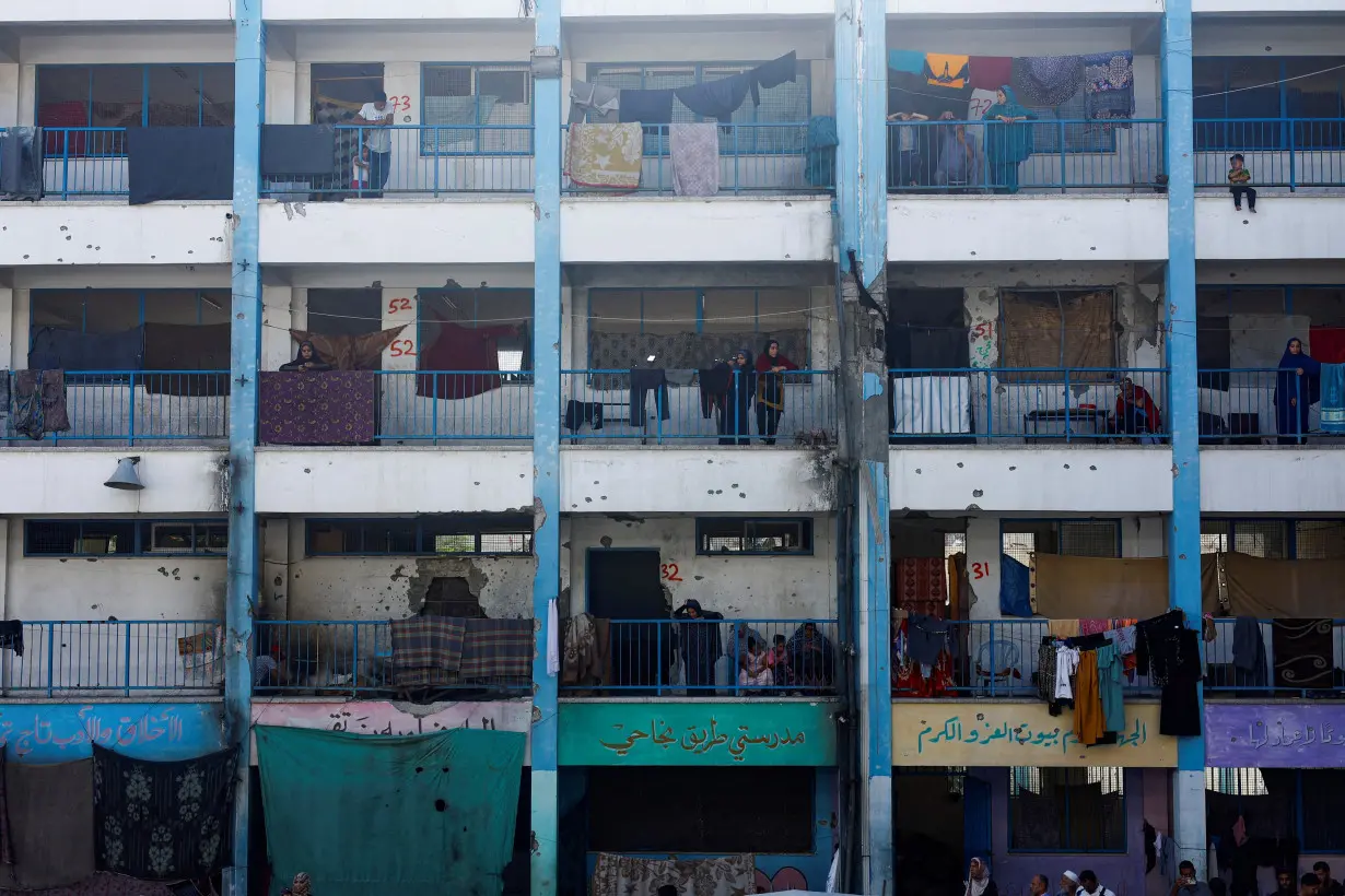 Displaced Palestinians shelter in a school, in Khan Younis in the southern Gaza Strip