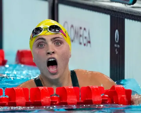 After fortune teller prediction, Australian swimmer celebrates world record Paralympic gold-medal win