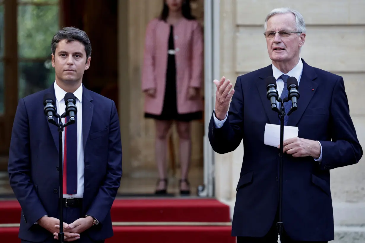 Newly appointed Prime minister Michel Barnier and Prime minister Gabriel Attal attend the handover ceremony in Paris