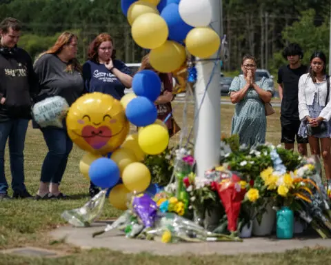 Georgia high school student, 14, kills 4 and wounds 9 in campus shooting