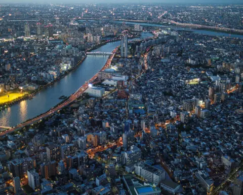 Why is Japan reviving debate on higher tax on investment income?