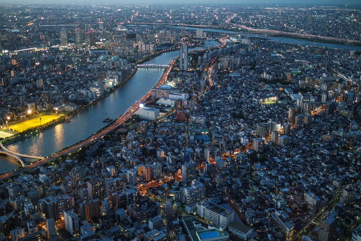 Office and residential buildings are seen from the observation deck of Tokyo Skytree