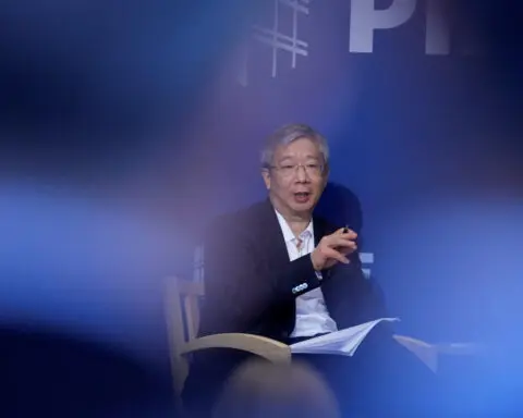 China's ex-central bank governor urges efforts to fight deflationary pressure