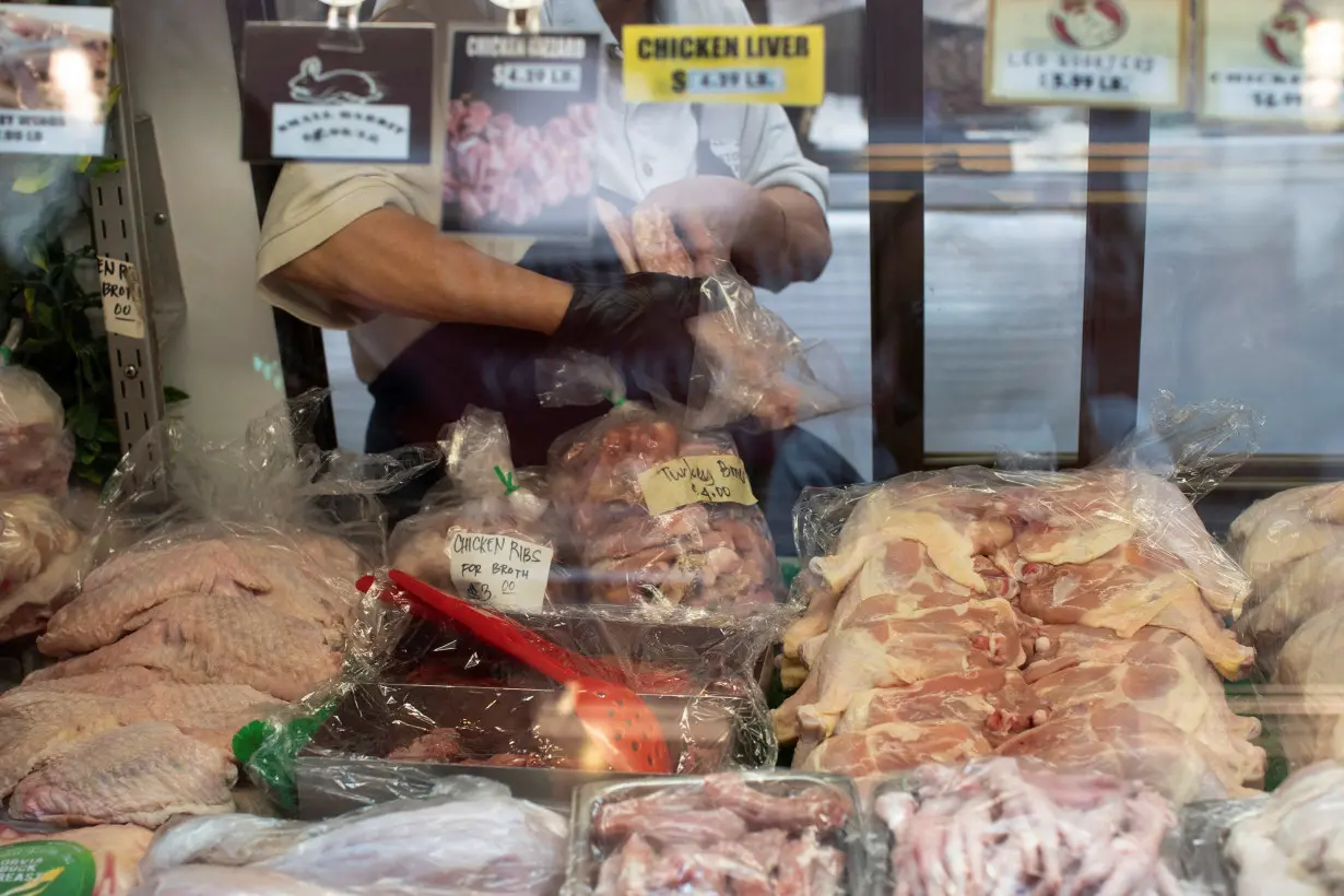 People shop for groceries at Eastern Market in Washington