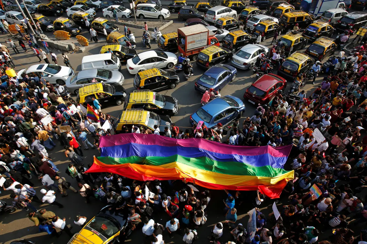 Participants walk during the Queer Azaadi Pride March in Mumbai