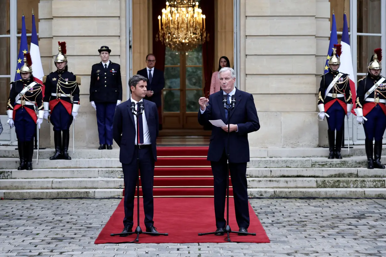 Newly appointed Prime minister Michel Barnier and Prime minister Gabriel Attal attend the handover ceremony in Paris