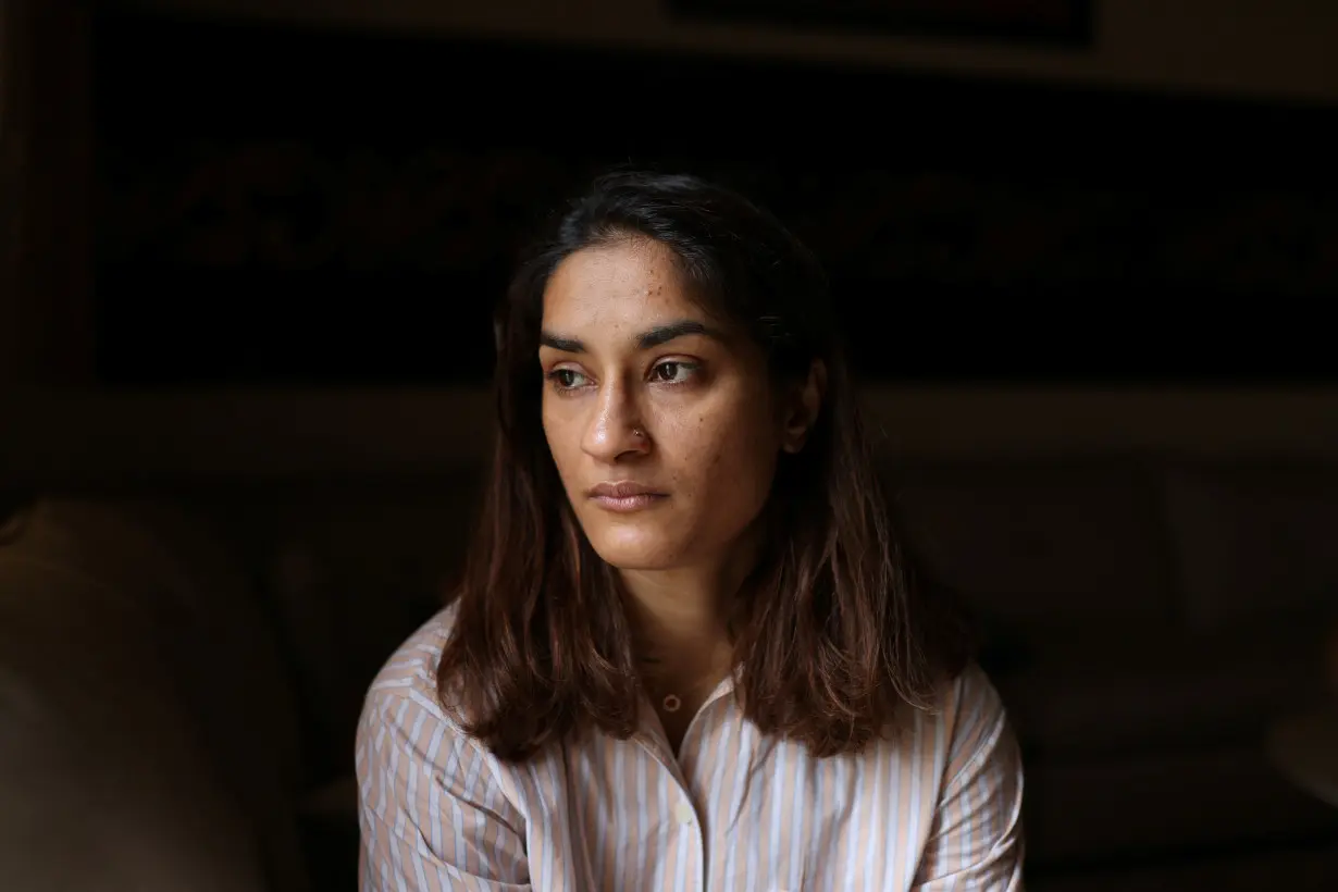 Indian wrestler Vinesh Phogat poses for a picture after an interview with Reuters at her residence in Sonipat in the northern state of Haryana