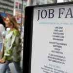 August US payrolls short of expectations, boosts bigger rate cut view