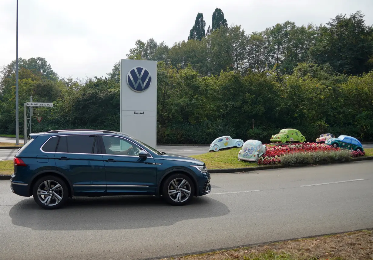 A vehicle drives near the Baunatal Volkswagen site