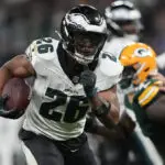 Barkley scores 3 TDs as Eagles beat Packers 34-29 in Brazil. Packers' Love injured in final minute