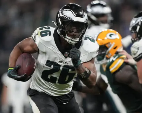 Barkley scores 3 TDs as Eagles beat Packers 34-29 in Brazil. Packers' Love injured in final minute