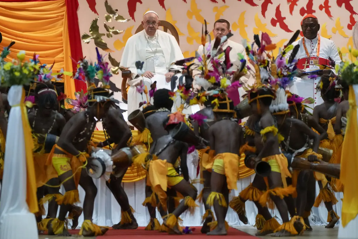 Pope urges church in Papua New Guinea to be close to women after hearing of sorcery 'superstitions'