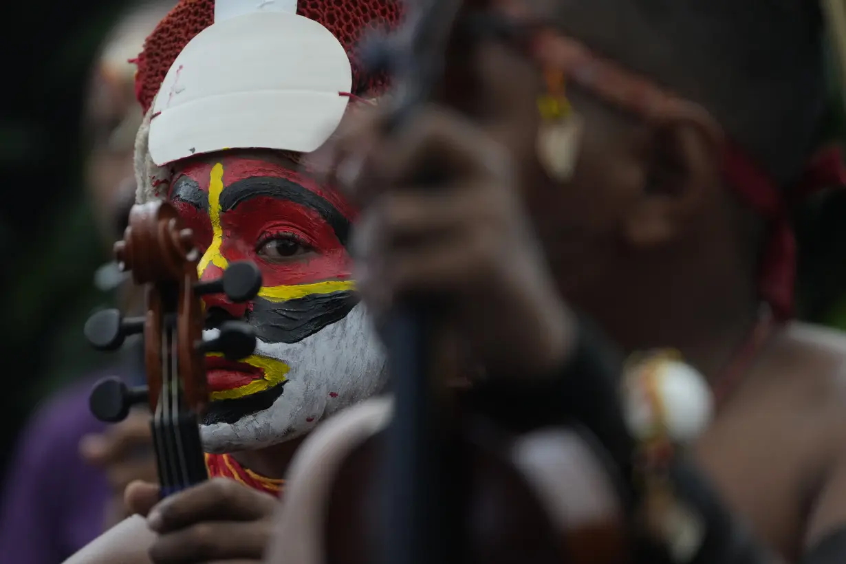 Pope urges church in Papua New Guinea to be close to women after hearing of sorcery 'superstitions'