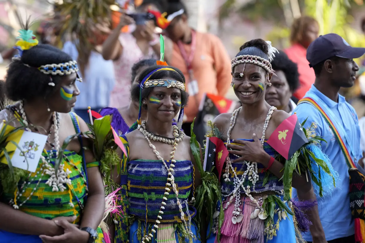 Pope urges church in Papua New Guinea to be close to women after hearing of sorcery 'superstitions'