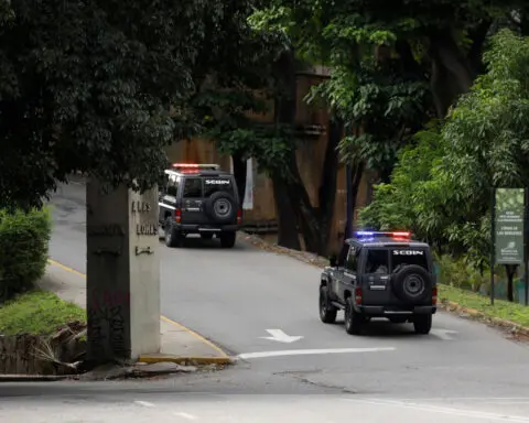 Venezuelan security forces surround Argentine embassy after opposition members take refuge inside