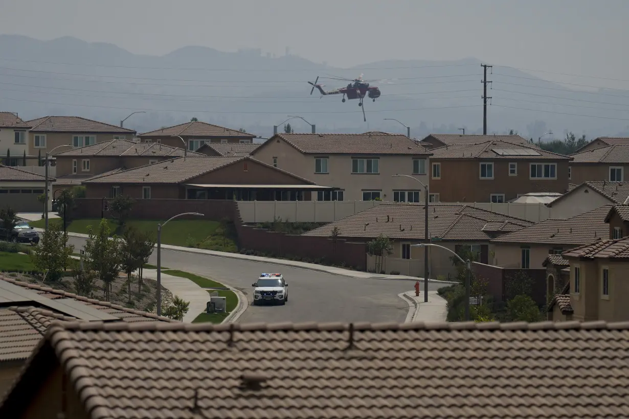 Evacuations ordered as wildfire burns in foothills of national forest east of LA