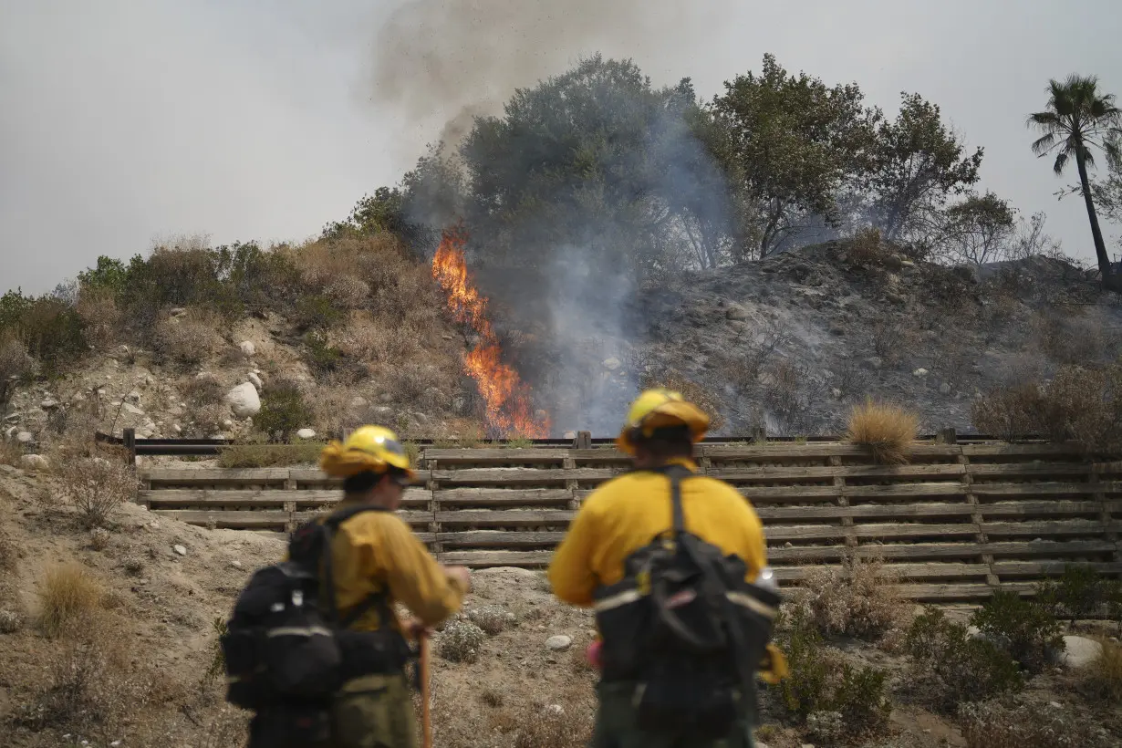 Evacuations ordered as wildfire burns in foothills of national forest east of LA