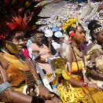 Pope brings in a ton of humanitarian aid, toys to remote Papua New Guinea as he celebrates periphery