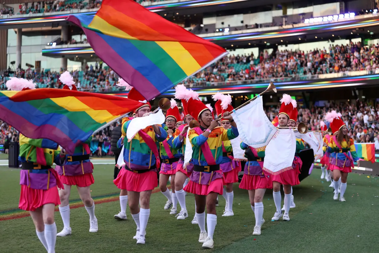 FILE PHOTO: Participants celebrate the Gay and Lesbian Mardi Gras Parade in Sydney