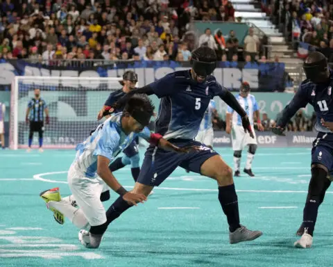 France wins gold in blind football at Paralympics under Eiffel Tower lights