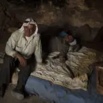 Chased away by Israeli settlers, these Palestinians returned to a village in ruins