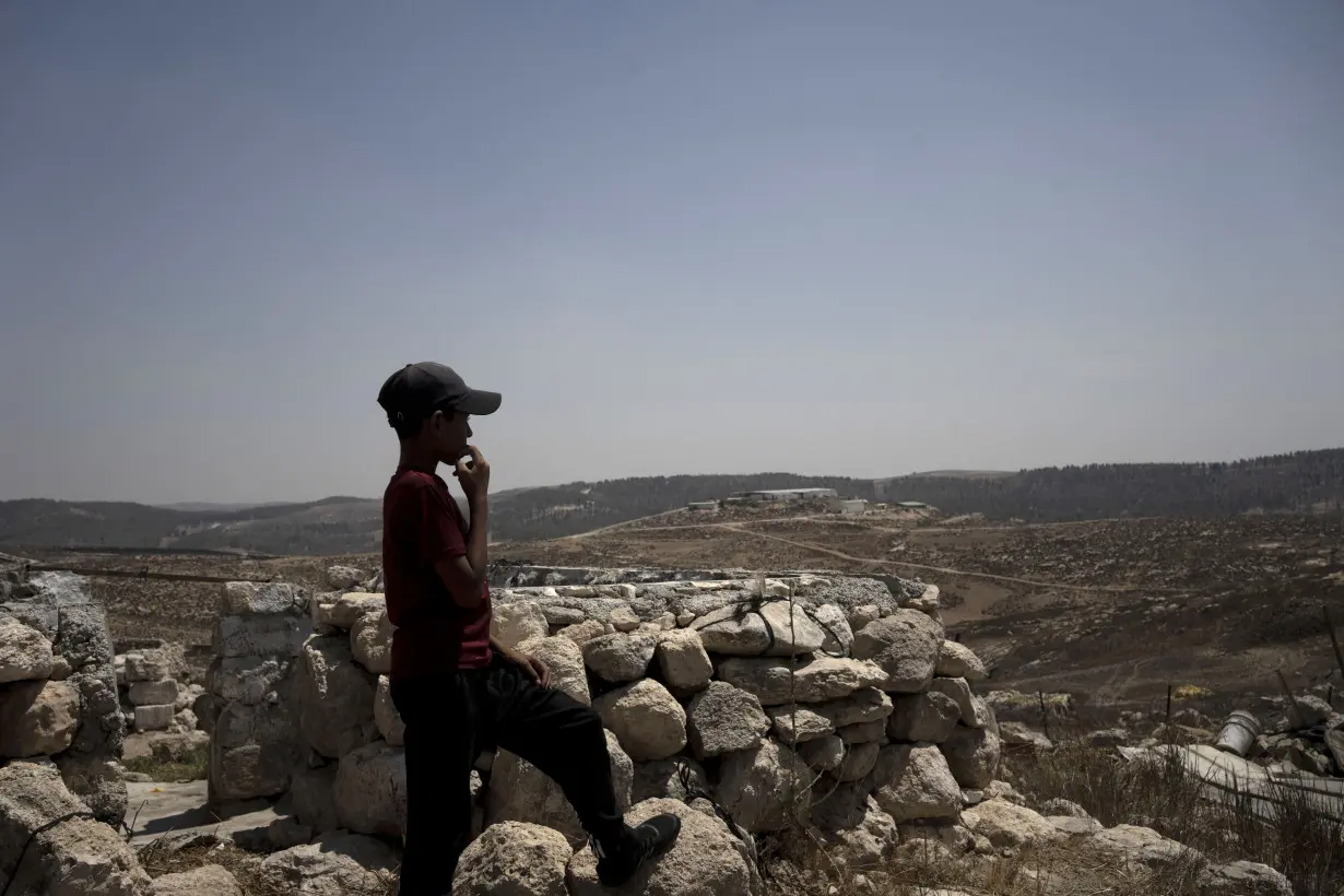 Chased away by Israeli settlers, these Palestinians returned to a village in ruins