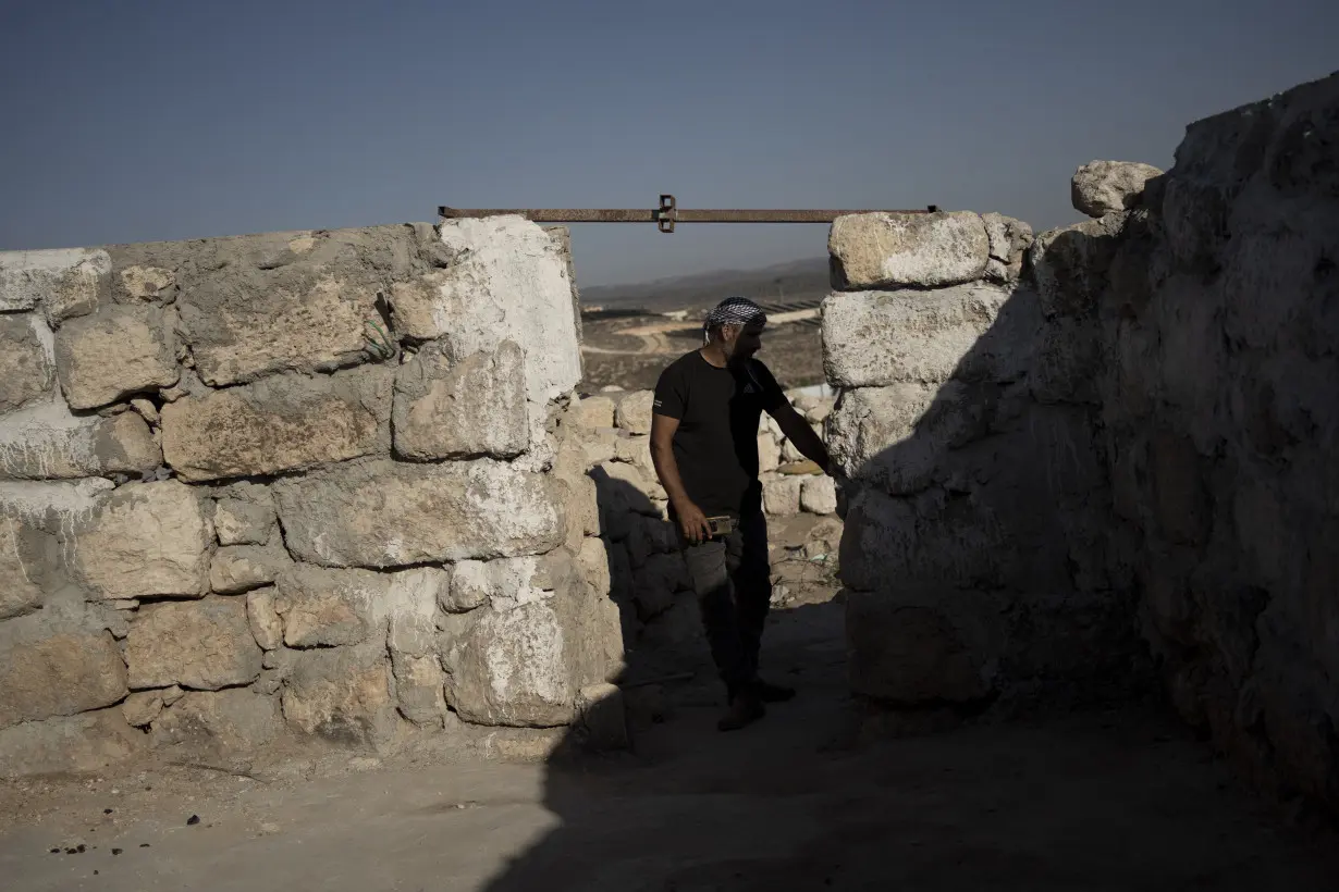 Chased away by Israeli settlers, these Palestinians returned to a village in ruins