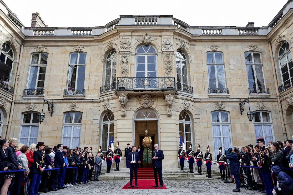 Newly appointed Prime minister Michel Barnier and Prime minister Gabriel Attal attend the handover ceremony in Paris