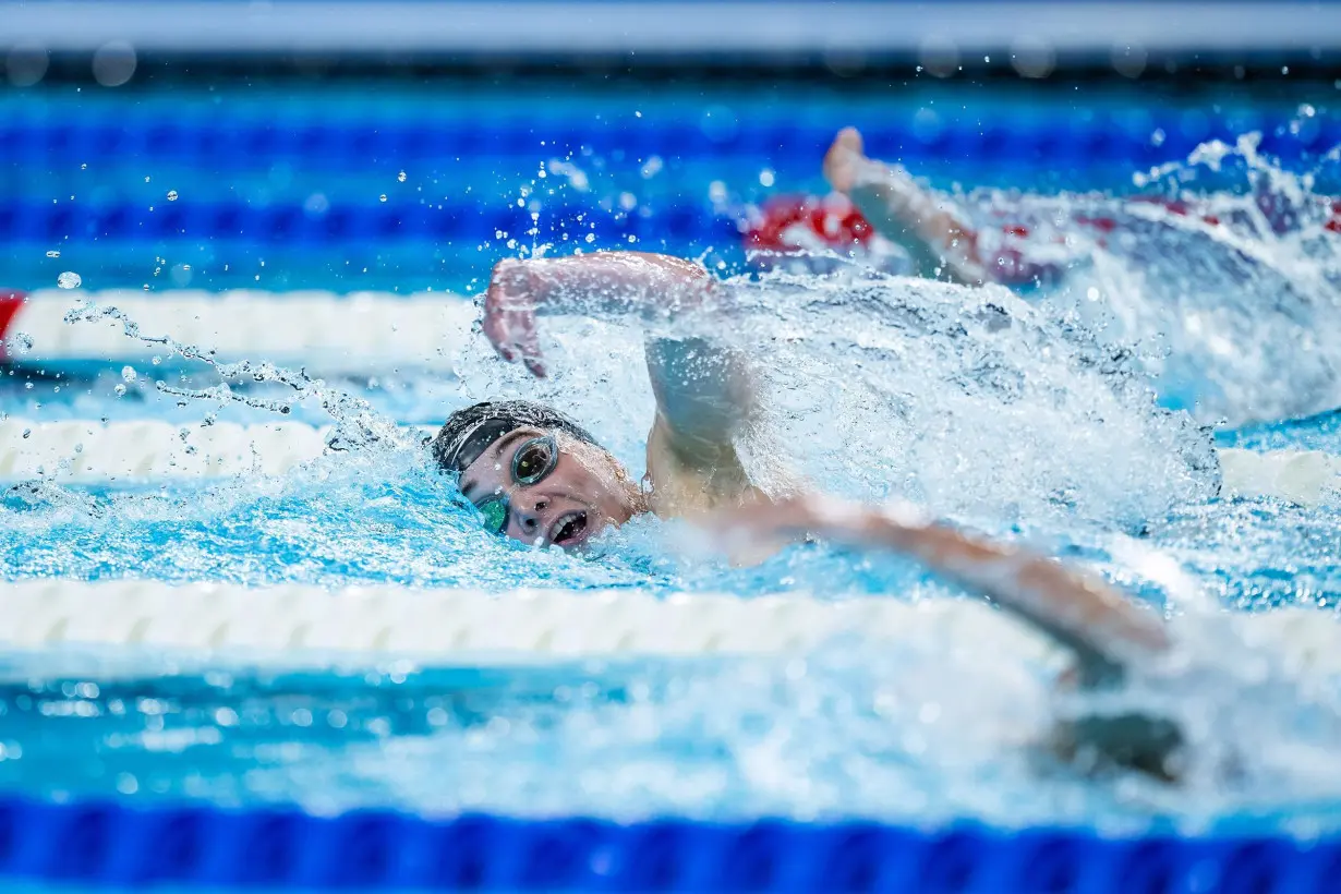 Reentering the pool caused 'flashbacks' to shark attack in which she lost her leg. Now this swimmer has two Paralympic medals