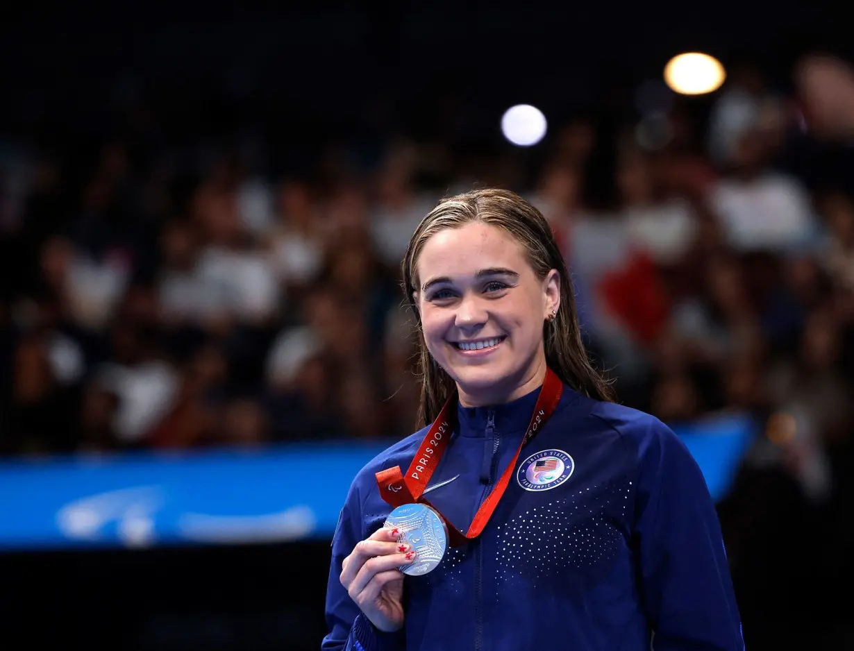 Reentering the pool caused ‘flashbacks’ to shark attack in which she lost her leg. Now this swimmer has two Paralympic medals