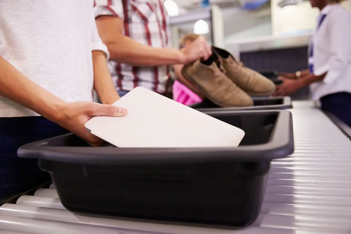 People are angry at Gen Z taking photos of airport trays. Here’s what’s really going on