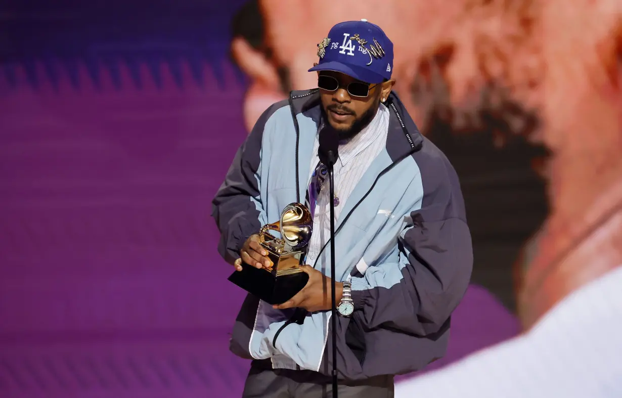 Kendrick Lamar accepts the Best Rap Album award for 