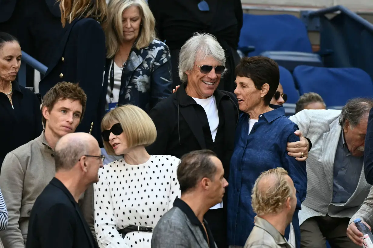 (From left) Eddie Redmayne, Anna Wintour and Jon Bon Jovi at the US Open final on Sunday in New York.