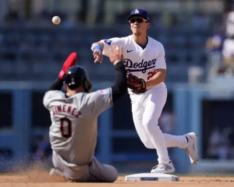 Ohtani hits 46th homer to tie career high, Dodgers beat Guardians 4-0 in record-tying heat