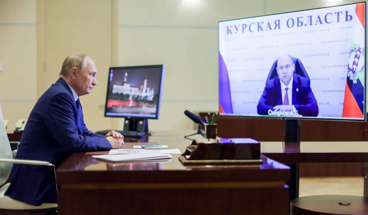 Russia's President Putin meets with Acting Governor of the Kursk region Smirnov via video link outside Moscow