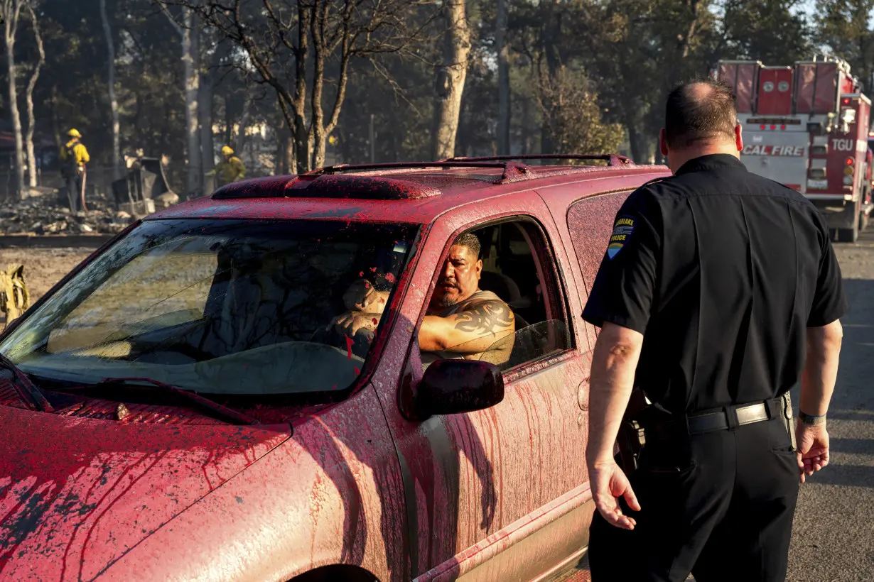 Lightning could worsen wildfire east of LA already threatening 35,000 homes and buildings