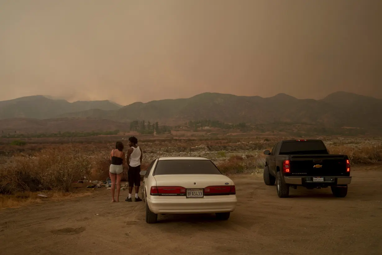 Lightning could worsen wildfire east of LA already threatening 35,000 homes and buildings