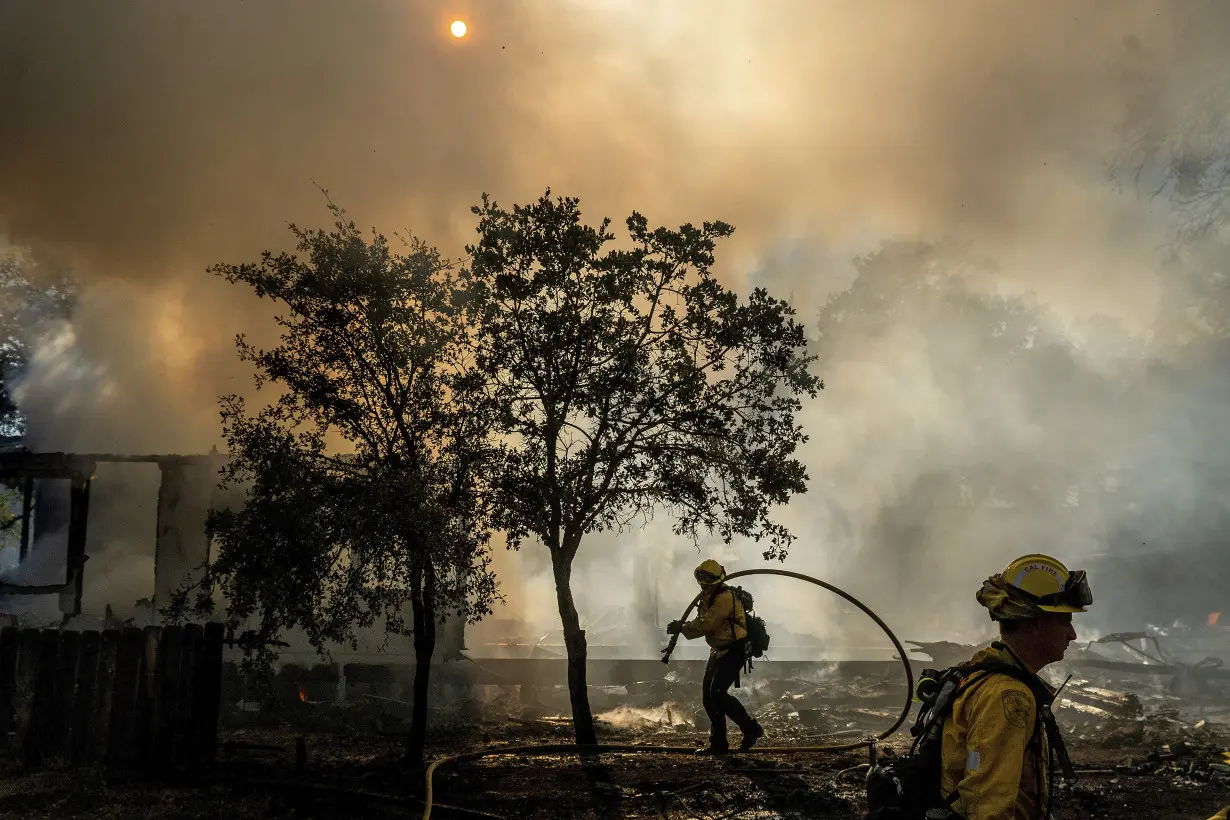 Lightning could worsen wildfire east of LA already threatening 35,000 homes and buildings