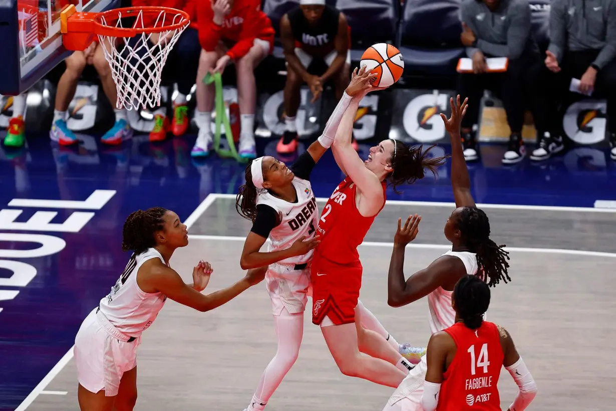 Caitlin Clark becomes fastest WNBA player to reach 300 assists with a double-double in Indiana Fever comeback victory